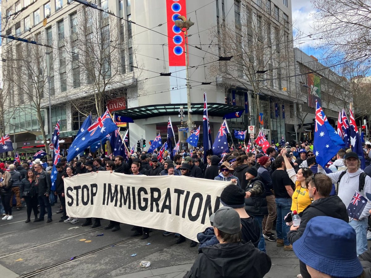 Nazis holding banner at intersection of Bourke and Swanston Streets, Naarm (Melbourne)